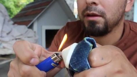 Using Candle And Plier Removing Security Tags From Clothes